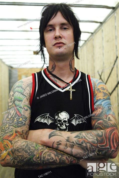 The Rev Arm Tattoos