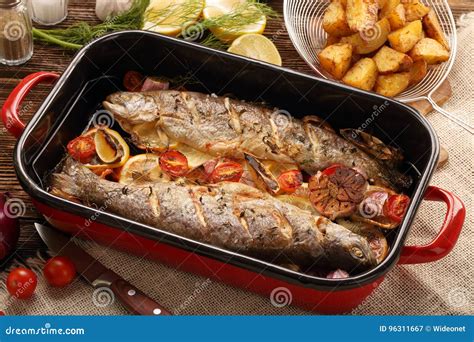 Baked Fish With Vegetables And Potatoes In Pan Stock Image Image Of