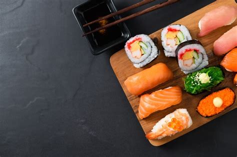 Premium Photo Close Up Of Sashimi Sushi Set With Chopsticks