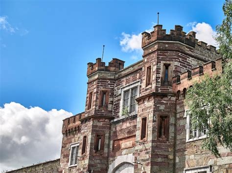 Premium Photo | Old celtic castle tower and a house Ancient Irish ...