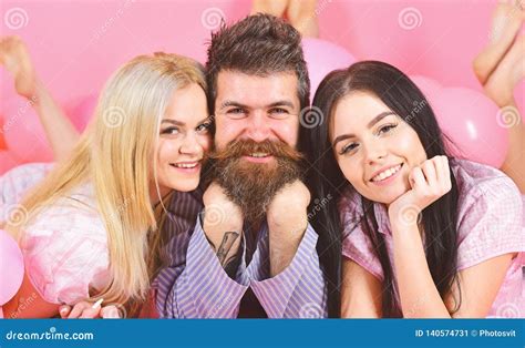 Girls Fall In Love With Bearded Macho Pink Background Threesome On