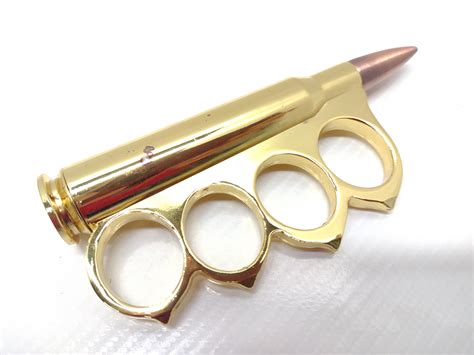 Metal .50 Caliber Bullet Shaped Knuckles Paperweight Gag Gif