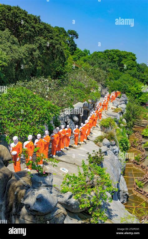 Statues Of Monks Standing In Line For Worshiping The Buddha The Golden