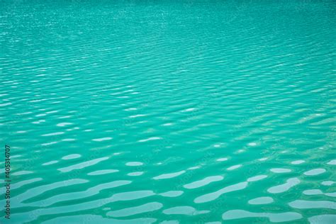 Turquoise lake surface Stock Photo | Adobe Stock