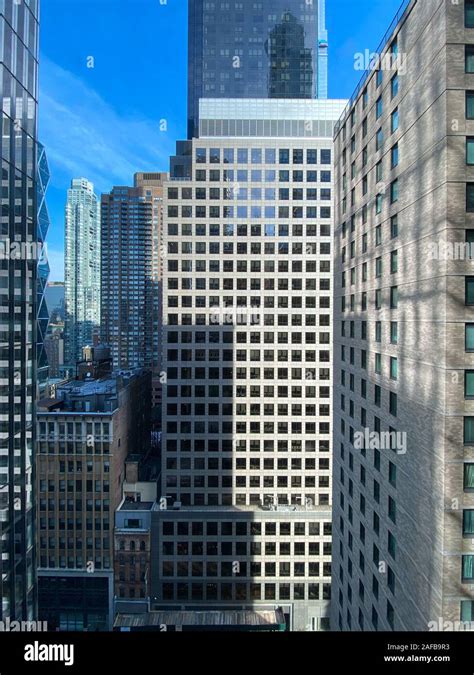 New York Cityscape During The Day Up Close Of Towering Buildings Stock