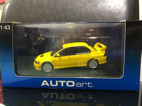 AUTOart 1 43 Mitsubishi Lancer Evolution VII Yellow Hobbies Toys