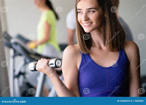 Happy Fit Fitness Girl Exercising Indoor In Fitness Center Stock Image