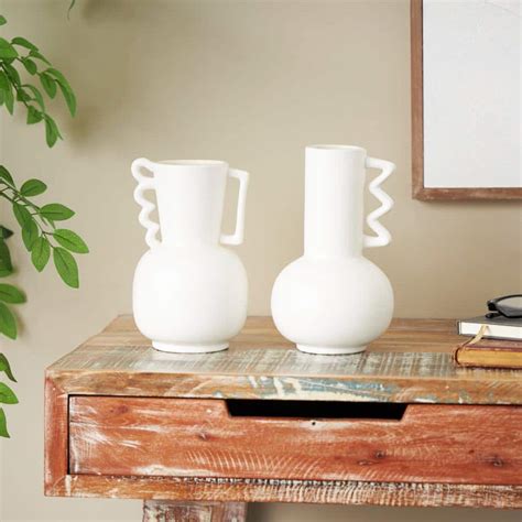 Litton Lane White Ceramic Decorative Vase With Varying Shapes And Wavy