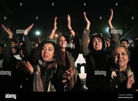 Greek And Turkish Cypriots Clap And Sing During A Peace Rally To Support The Peace Talks Inside