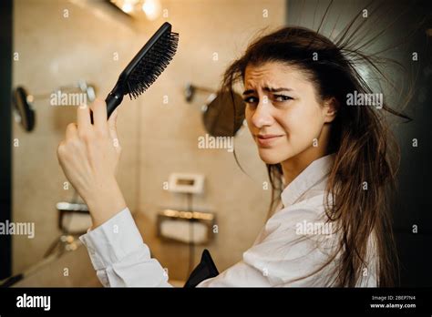 Woman Doing Her Hair Styling With A Brush At Home Bad Hair Day Daily