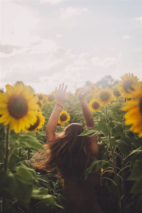 Sensual Portrait Of A Girl In A Sunflower Field By Stocksy Contributor Paff Stocksy