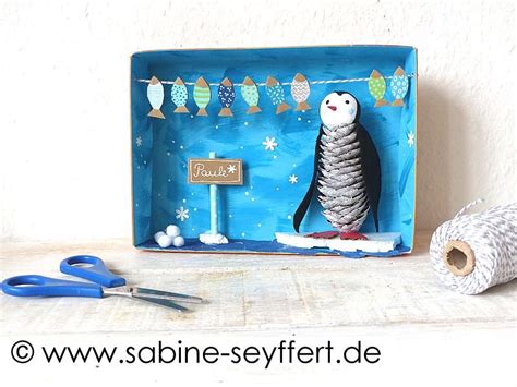 Winterliche Bastelidee F R Kinder Pinguin Fische Aus Tannenzapfen