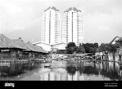 A slum area of a fishing village with a backdrop of magnificent ...