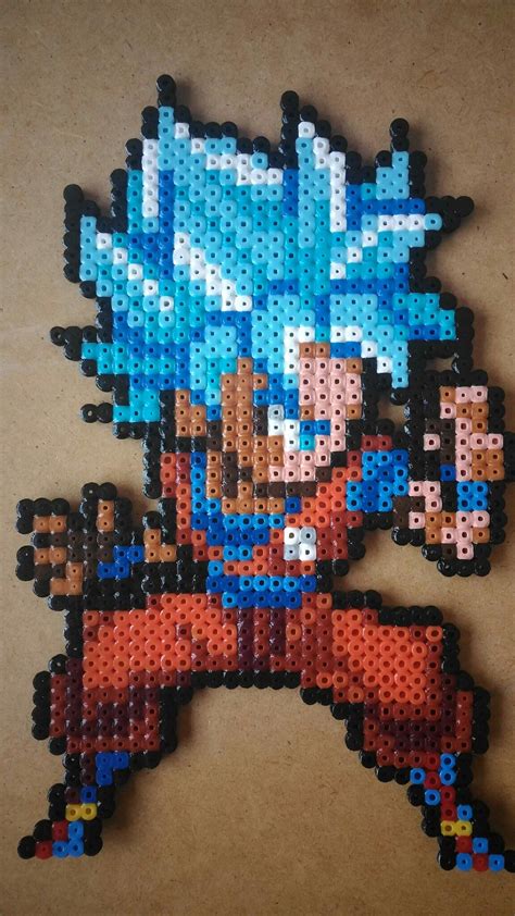 Super Saiyan Goku Perler Bead Sprite Bead Sprite Perler Beads Perler Images And Photos Finder