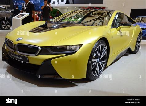 A BMW I8 Protonic Frozen Yellow Edition Is On Display During The 2018