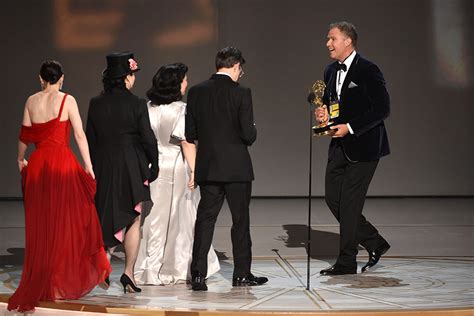 Will Ferrell presents an award to the cast and crew of “The Marvelous ...