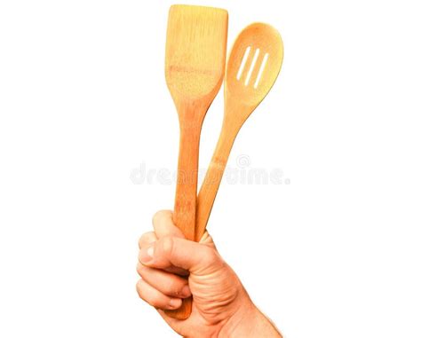 Wooden Spatula for Frying in Hand Isolated on White Background Stock ...