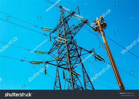 High Voltage Power Line Transmission Tower Stock Photo 2023641791