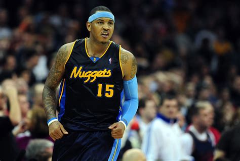 Denver Nuggets forward Carmelo Anthony (15) celebrates after shooting ...