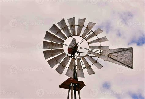 A Windmill With A Metal Pole And A Metal Roof 34629778 Stock Photo At