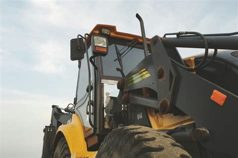 Yellow and Black Heavy Equipment Under Blue Sky · Free Stock Photo