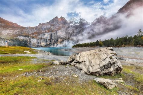 Premium Photo Spectacular Autumn View Of Oeschinensee Lake Scene Of