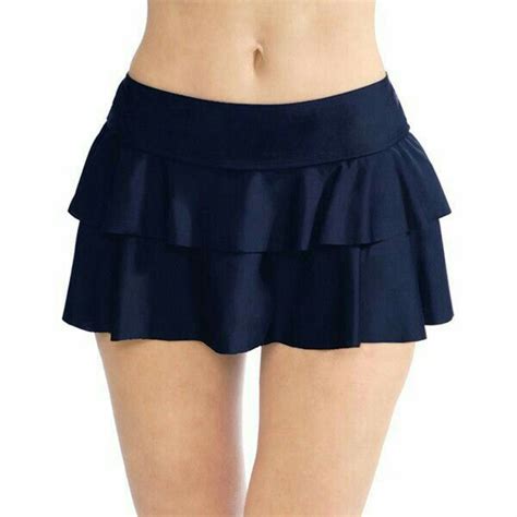 A Women S Black Skirt With Ruffles On The Bottom