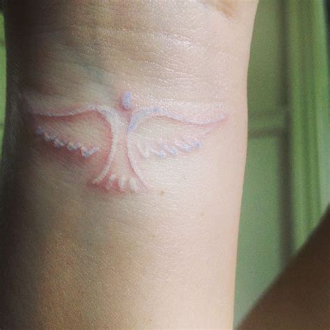 White angel/dove tattoo in memory of my grandmother | Picture tattoos, Tattoos, White dove tattoos