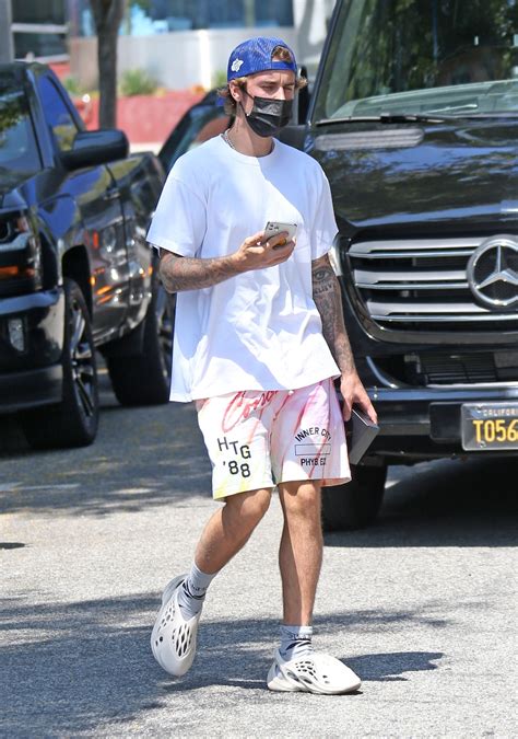 Justin Bieber Wears Kanye Wests Wild Yeezy Foam Runners On A Date With