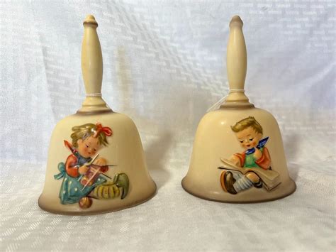 TWO COLLECTIBLE ANNUAL BELLS 1983 1980 M J HUMMEL EstateSales Org