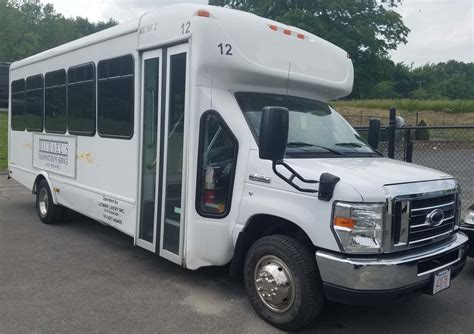 Budget Shuttle Bus 24 Passenger Michaels Limousines