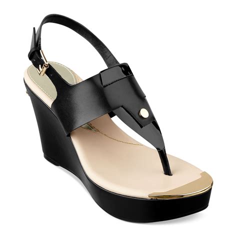 Lyst Guess Magli Platform Wedge Thong Sandals In Black