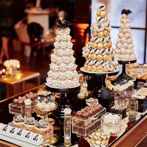 French Macaron Towers And Sweets For This Dessert Tablescape Created