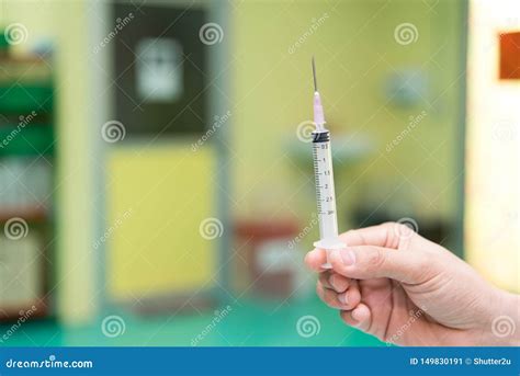 Syringe And Ampule Medical Injection In Hand Hospital And Medical