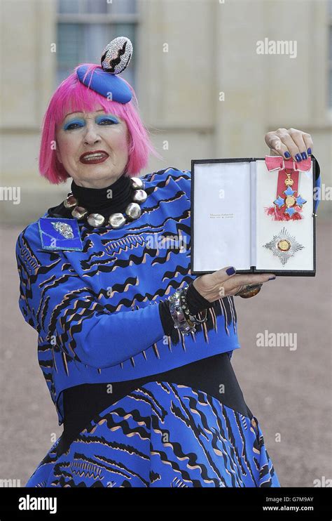 Fashion Designer Zandra Rhodes Holding Her Dame Commander Of The Order