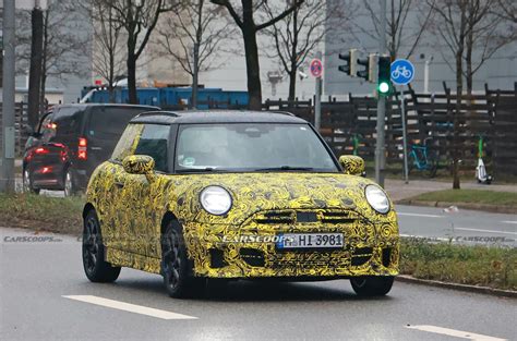 ICE Powered Mini JCW Hot Hatch Shows Off Cooper EV Style Lights Carscoops