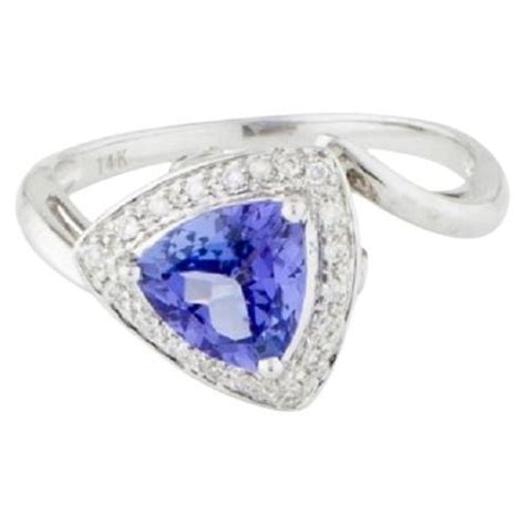 elegant  white gold tanzanite  diamond cocktail ring rectangular