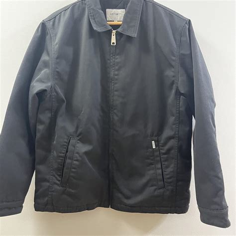 Medium Black Carhartt jacket Warm padded lining on... - Depop