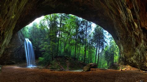 waterfalls near trees and cave during day #nature #landscape #trees # ...