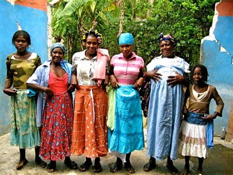 Traditional Dress For Woman In Haiti Is A Long Colorful Skirt A