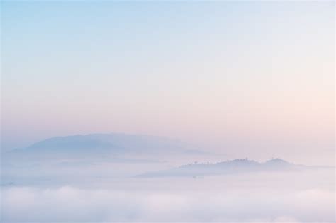premium photo surreal landscape  morning foggymorning clouds