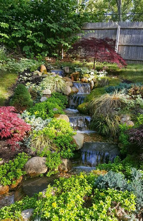 23 Awesome Artificial River Ideas For Your Garden Homemydesign