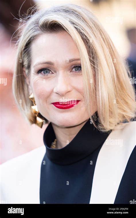 Sian Brooke Poses For Photographers Upon Arrival At The Olivier Awards