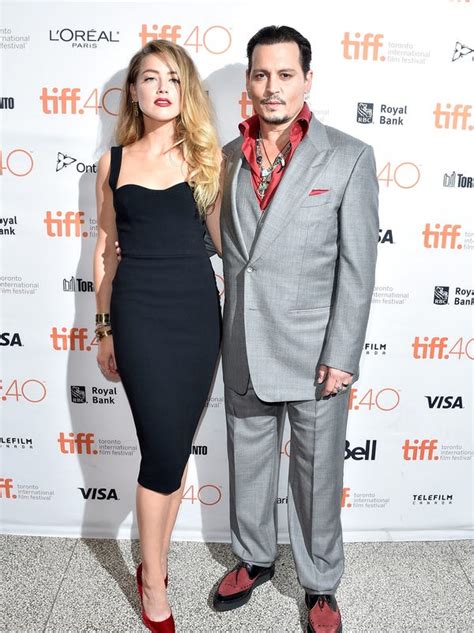 Amber Heard Johnny Depp Reach Divorce Settlement