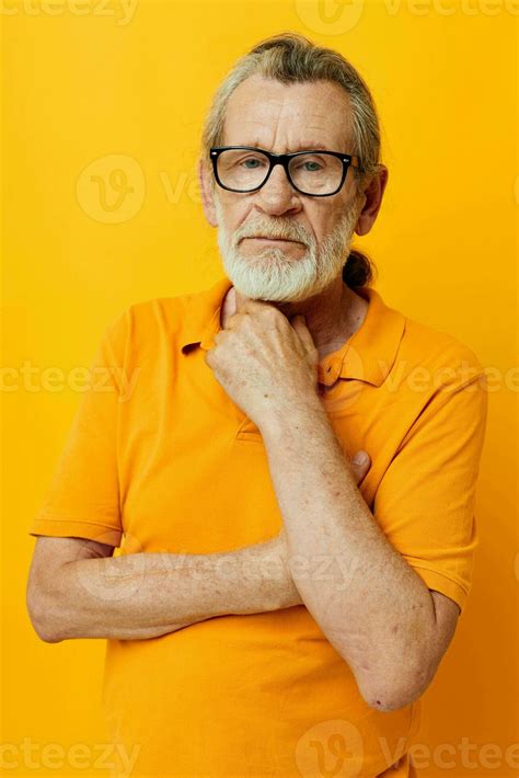 Elderly Man Posing Yellow Tshirt Glasses Cropped View 25710669 Stock