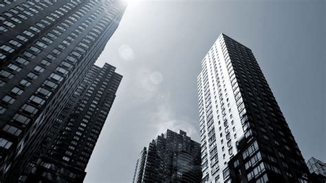 Wallpaper Low Angle Photography Of High Rise Buildings Under White