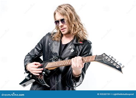 Handsome Rocker In Sunglasses Posing Playing Electric Guitar Isolated