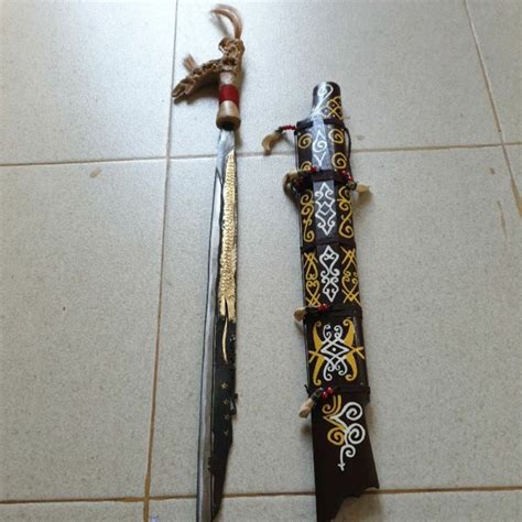 jual mandau senjata khas dayak kalimantanmandau motif naga emas