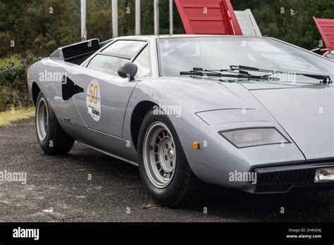 Front Side View Of A Restored Silver Lamborghini Countach Lp400 Sports