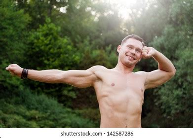 Man Naked Torso Stands His Hands Stock Photo 142587286 Shutterstock